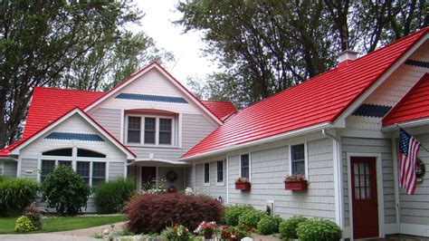 house with red metal roof|houses with red shingle roofs.